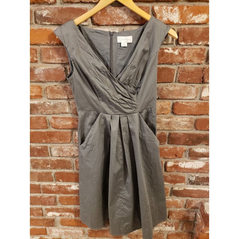 Jessica Simpson gray dress criss cross top and pleated skirt. Size 4